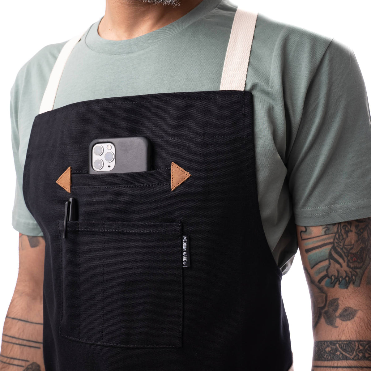 Apron with cell phone pocket and leather detailing